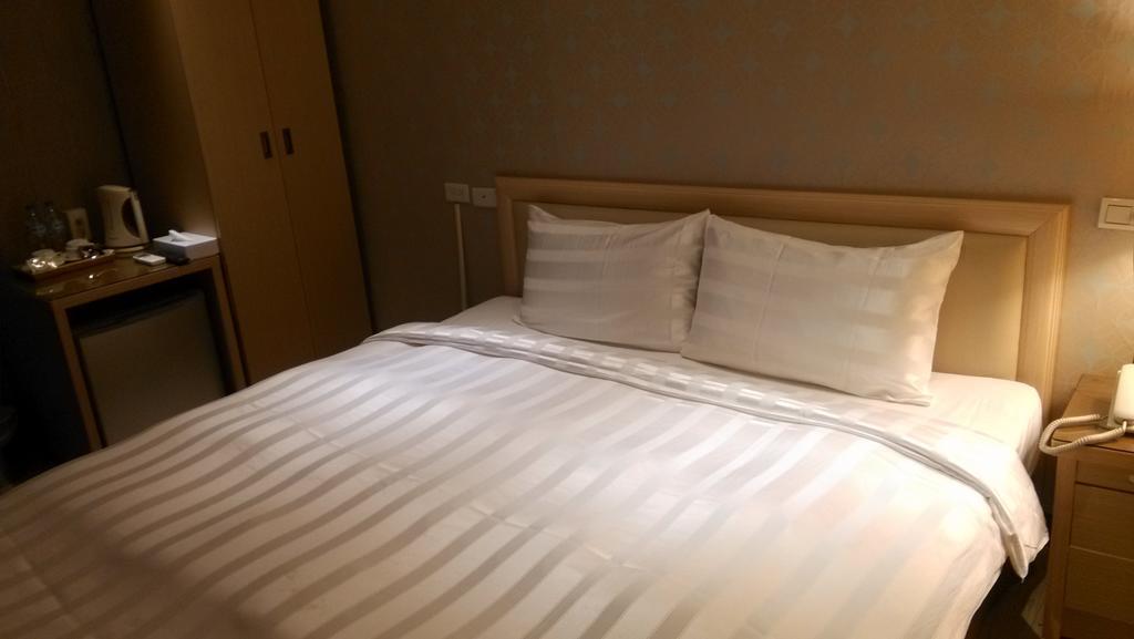 A Casa Hotel Taoyuan Buitenkant foto