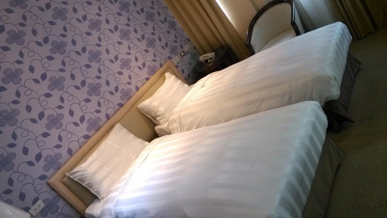 A Casa Hotel Taoyuan Buitenkant foto